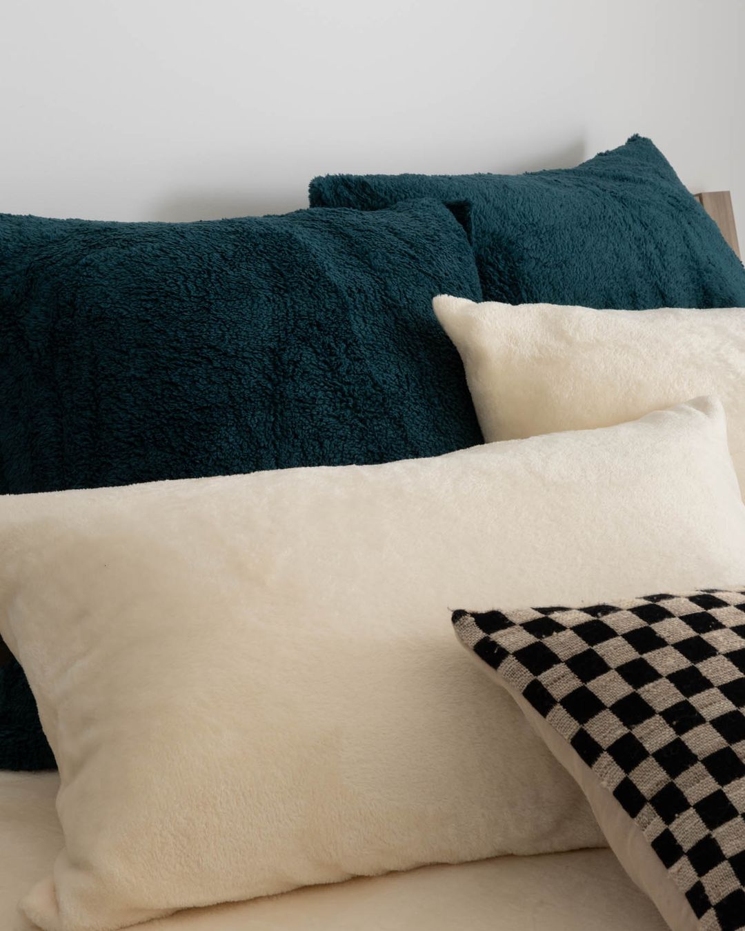 Close-up of the Morgan and Reid Deep Teal Snuggle Fleece European Pillowcase Pair showing fabric texture