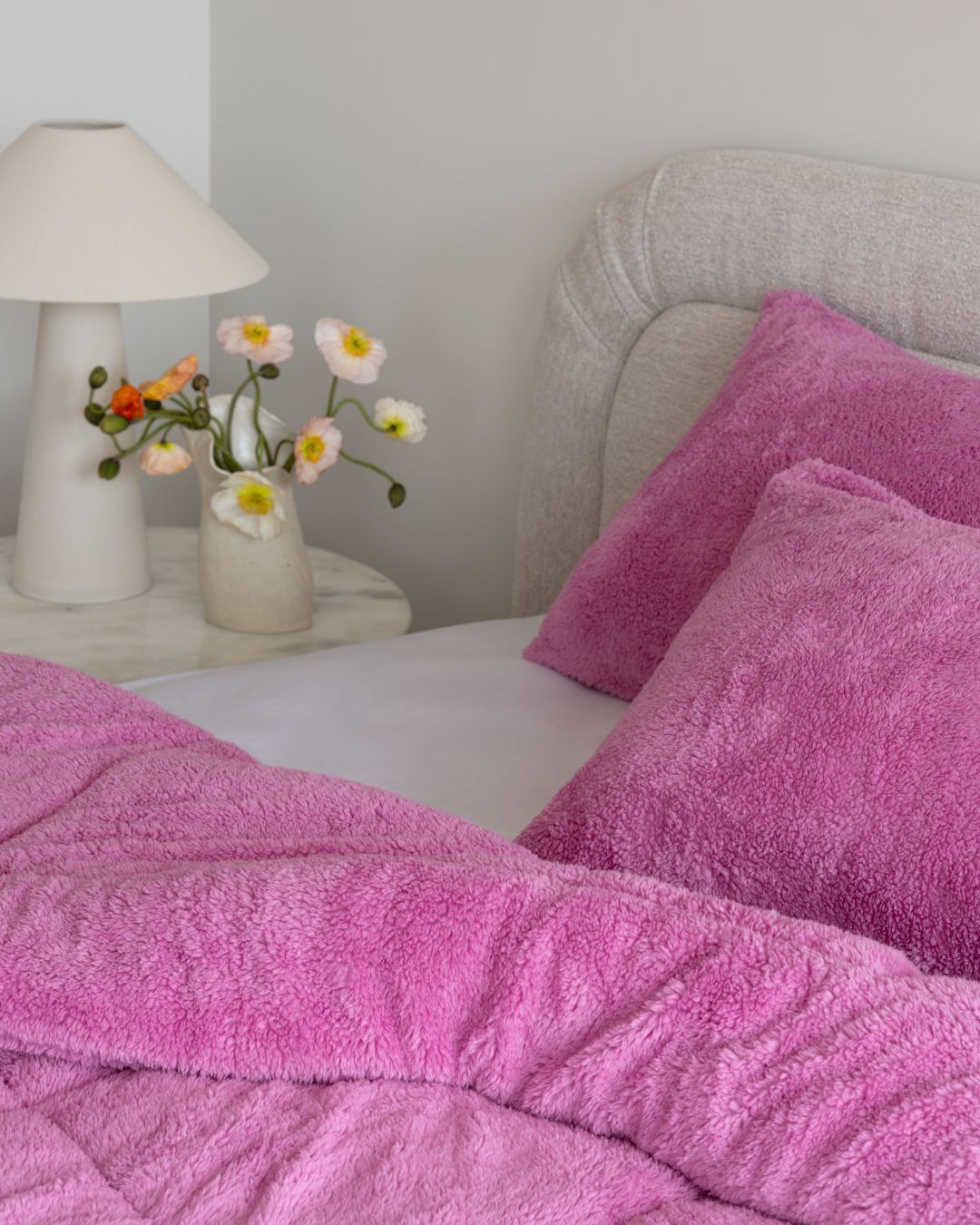 Morgan and Reid All Seasons Snuggle Fleece Crocus Comforter Set on a bed with matching pillowcases