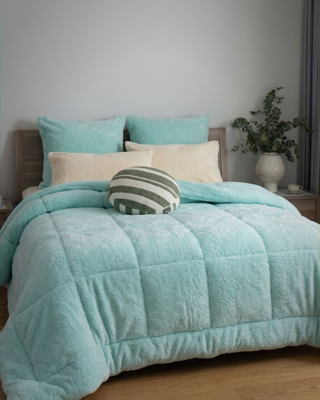 Morgan and Reid All Seasons Snuggle Fleece Mint Comforter Set styled on a neatly made bed in a bright bedroom