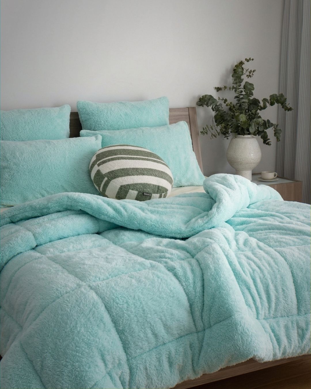Close-up of the Morgan and Reid All Seasons Snuggle Fleece Mint Comforter Set showing fabric texture and colour