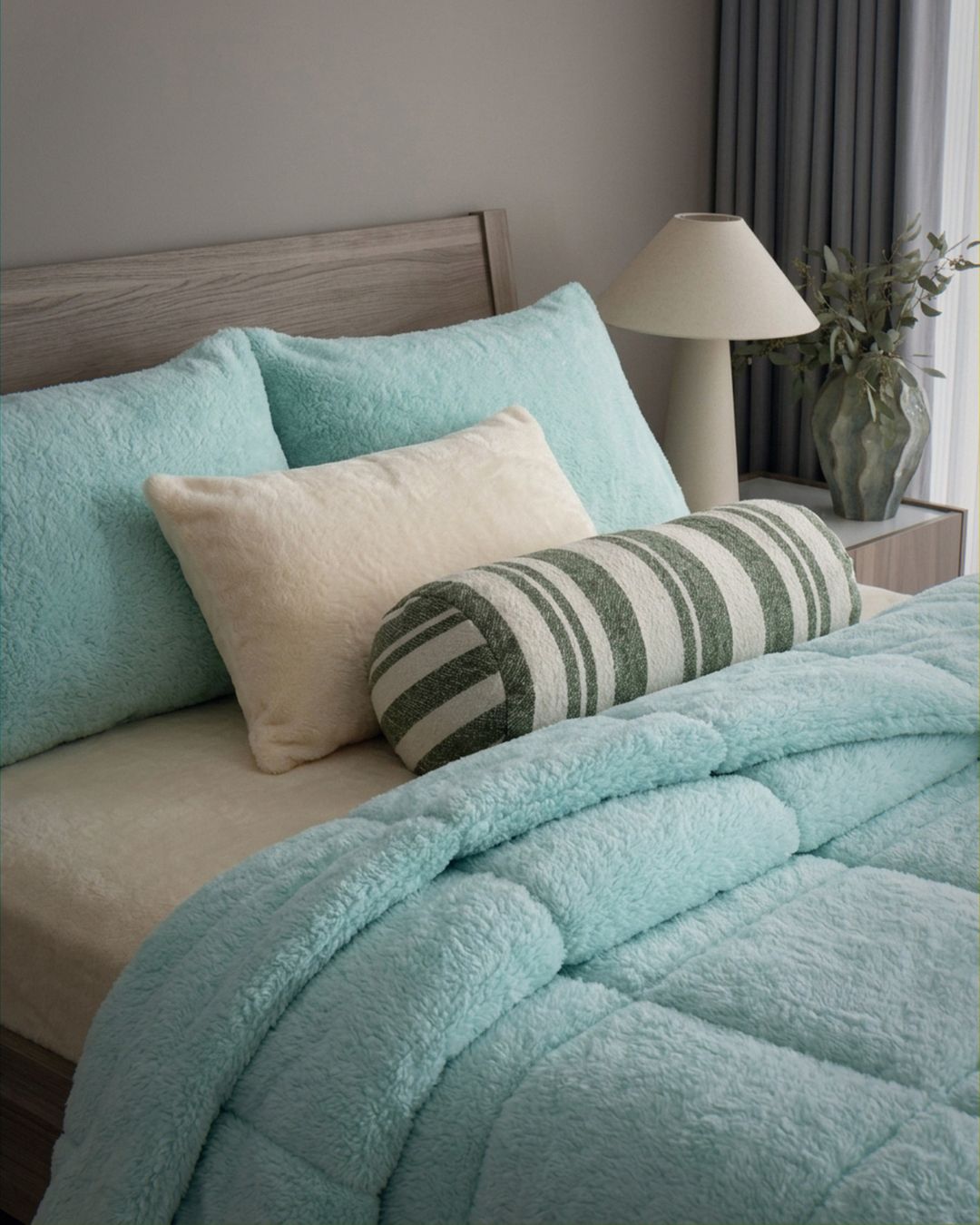 Overhead view of the Morgan and Reid All Seasons Snuggle Fleece Mint Comforter Set on a made bed