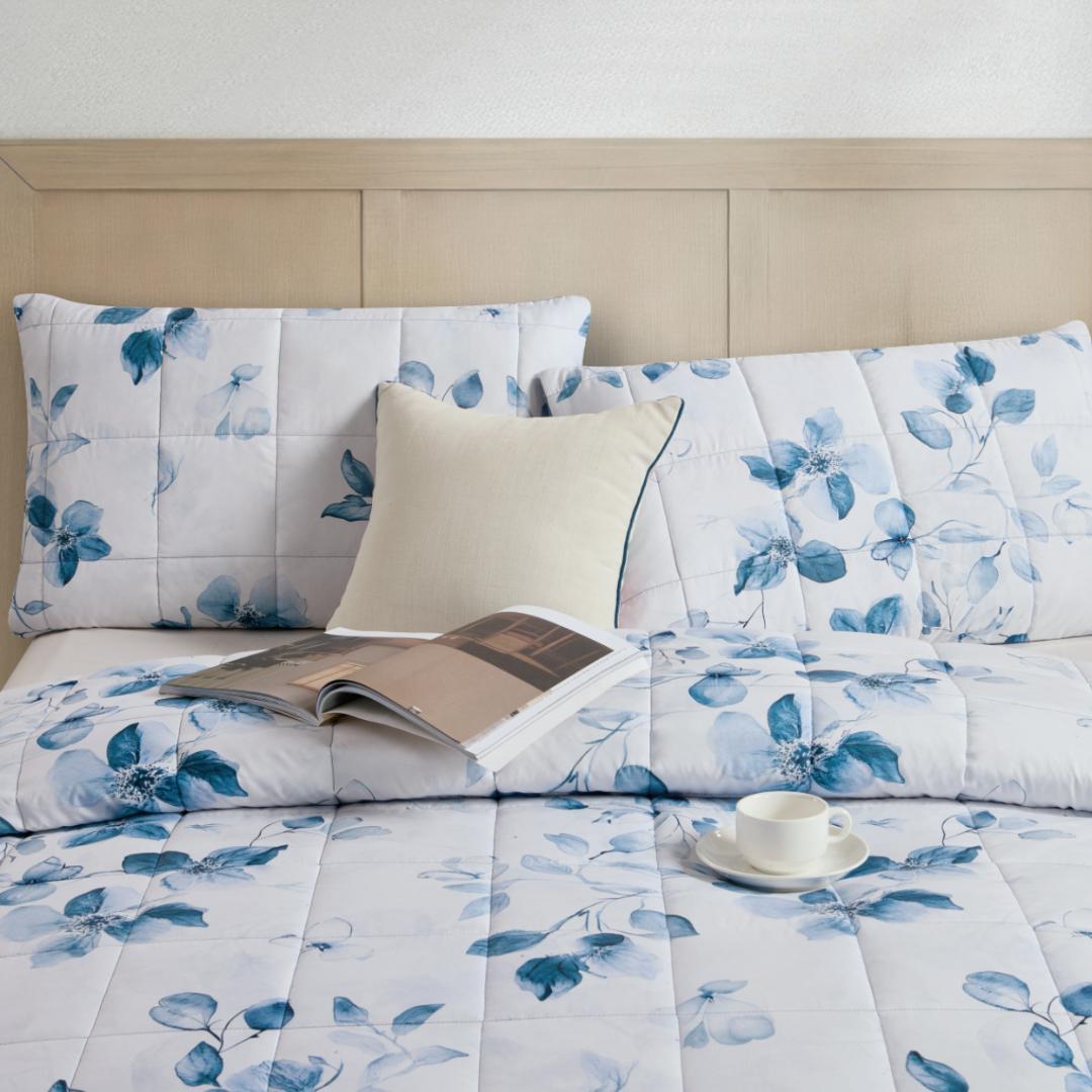 Detail of the Morgan and Reid Blue Eucalyptus Cloudy Coverlet Set stitching and design