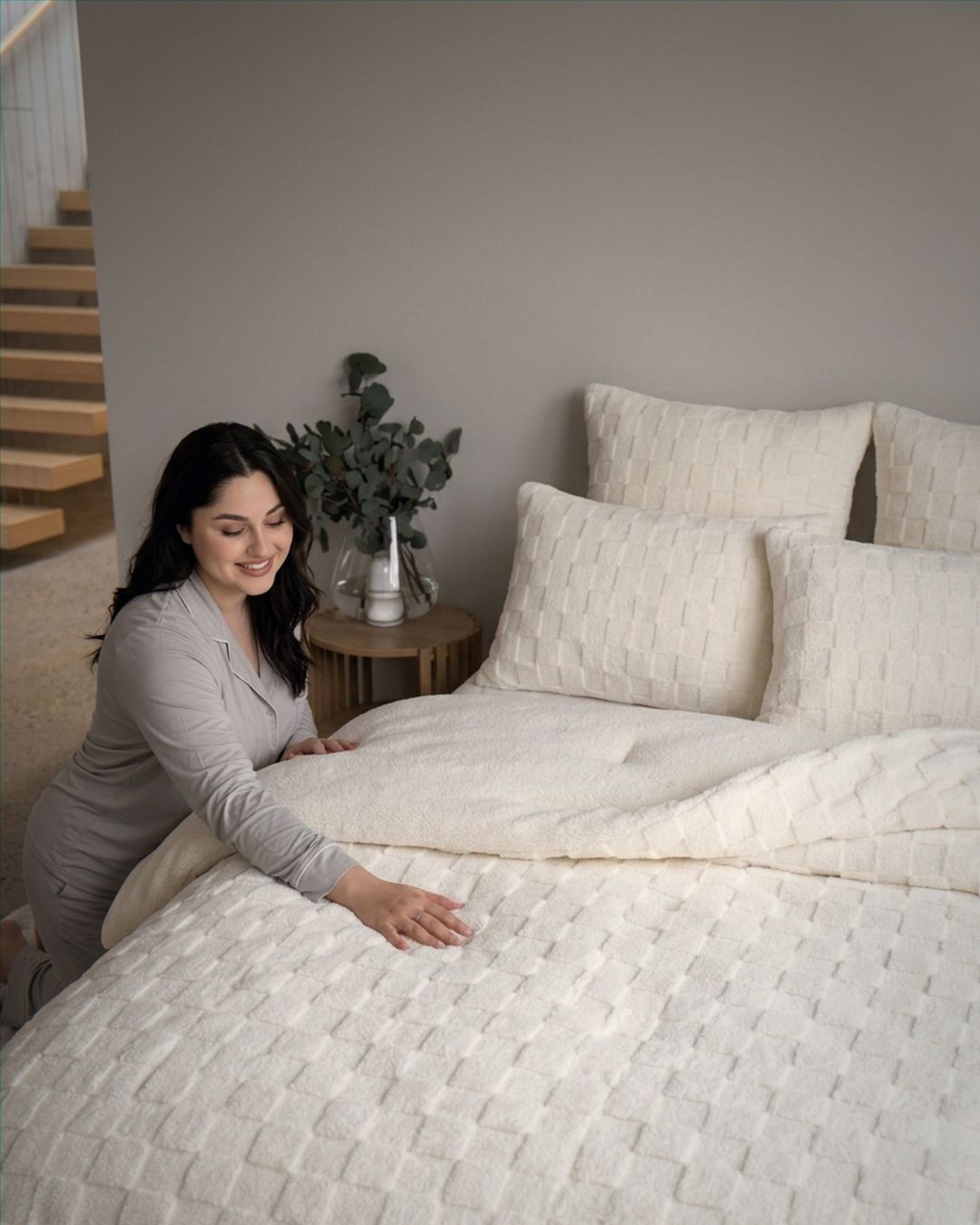 Morgan and Reid Checkered Cream Snuggle Fleece Pillowcase Pair on bed with coordinating bedding