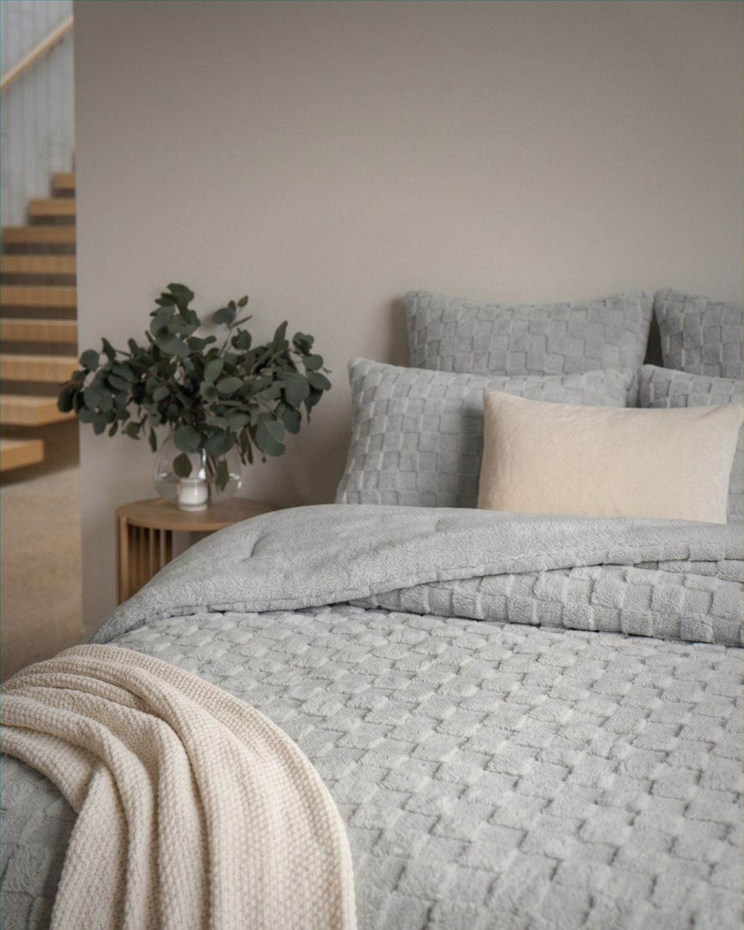 Close-up of the Morgan and Reid Checkered Silver Snuggle Fleece European Pillowcase Pair showing fabric texture