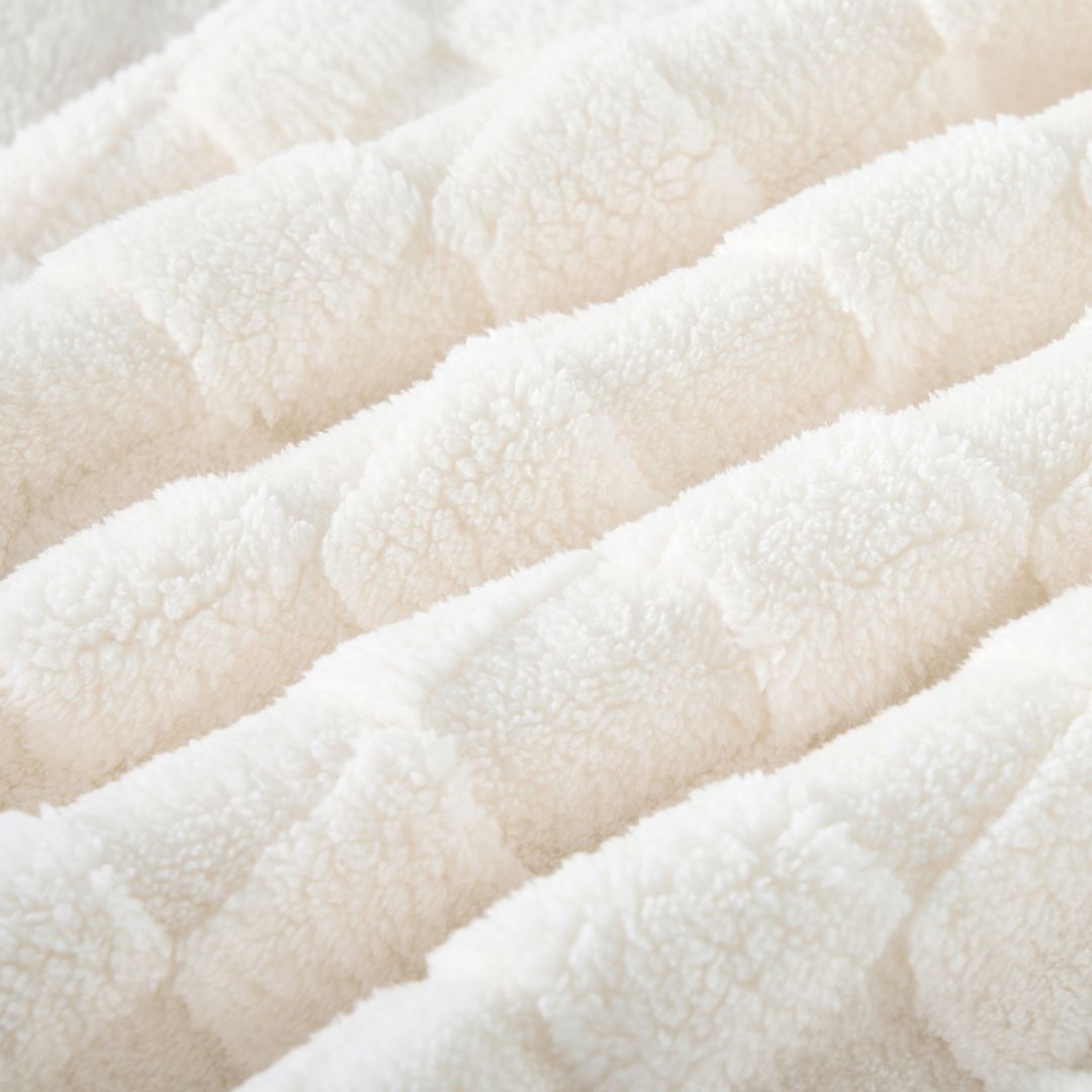 The Morgan and Reid Checkered Cream Snuggle Fleece European Pillowcase Pair features a cozy, ultra-soft fleece with a stylish white checkerboard texture—perfect for pairing with your decorative pillows.