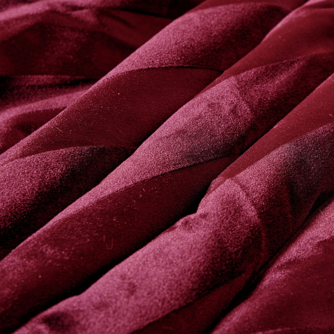 Detail shot of the Morgan and Reid Cherry Red Velvet Stripe Snuggle Fleece European Pillowcase Pair on a pillow
