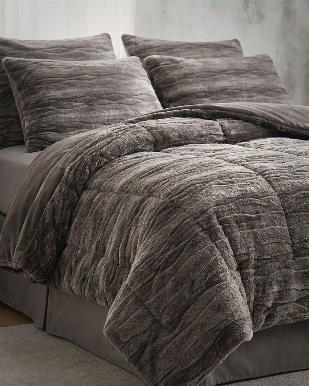Close-up of the Morgan and Reid Deep Cocoa Snuggle Fleece Rabbit Fur European Pillowcase Pair showing fabric texture