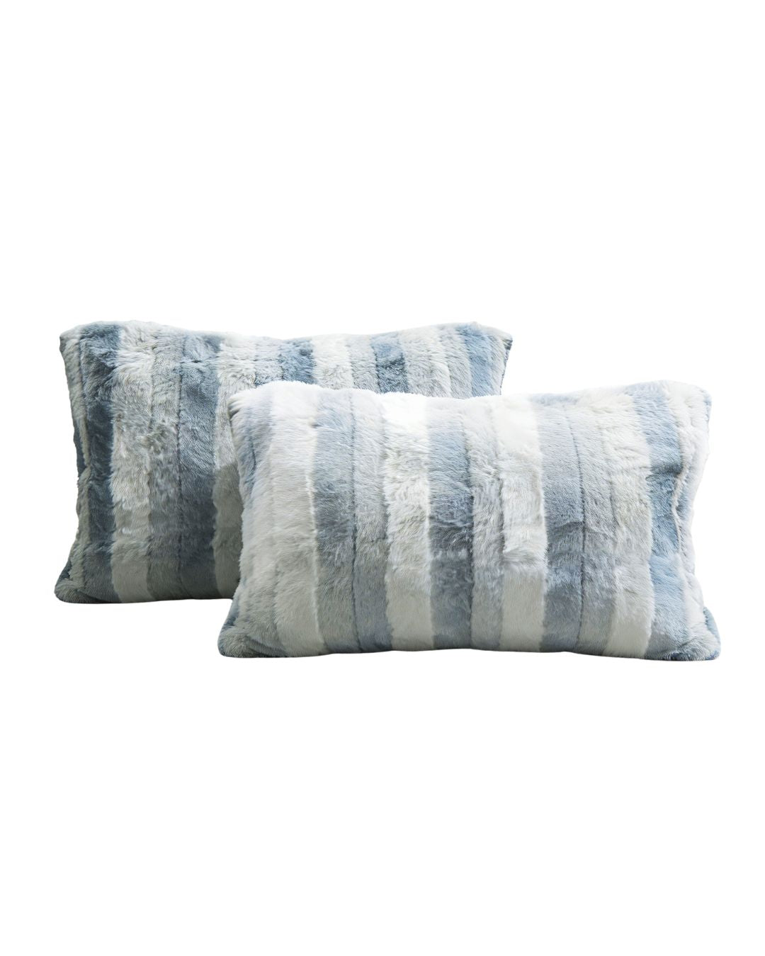 Morgan and Reid Silver Snow Rabbit Fur Pillowcase Pair on a styled bed with matching comforter