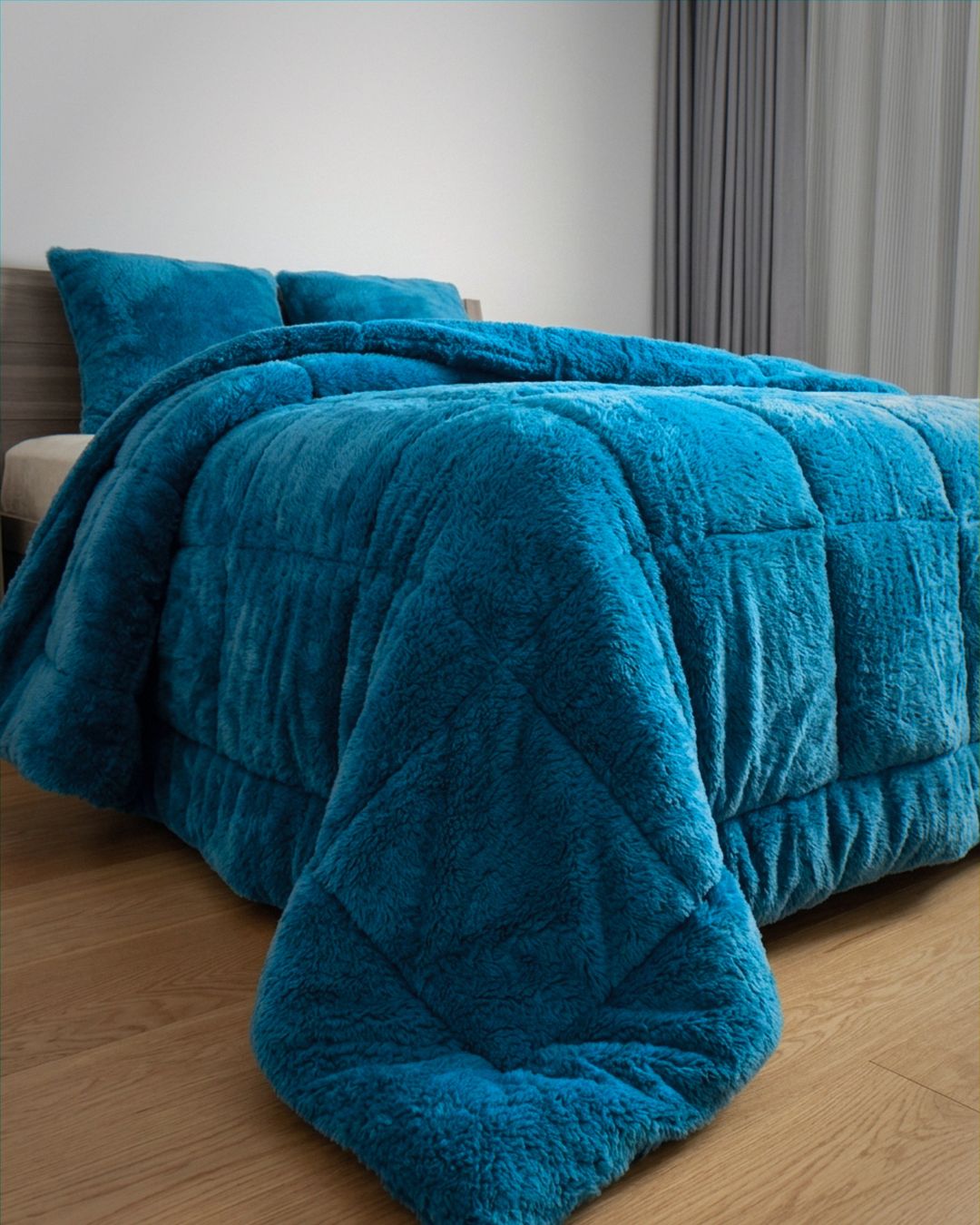 Detail shot of the Morgan and Reid Riverside Snuggle Fleece Pillowcase Pair on pillows