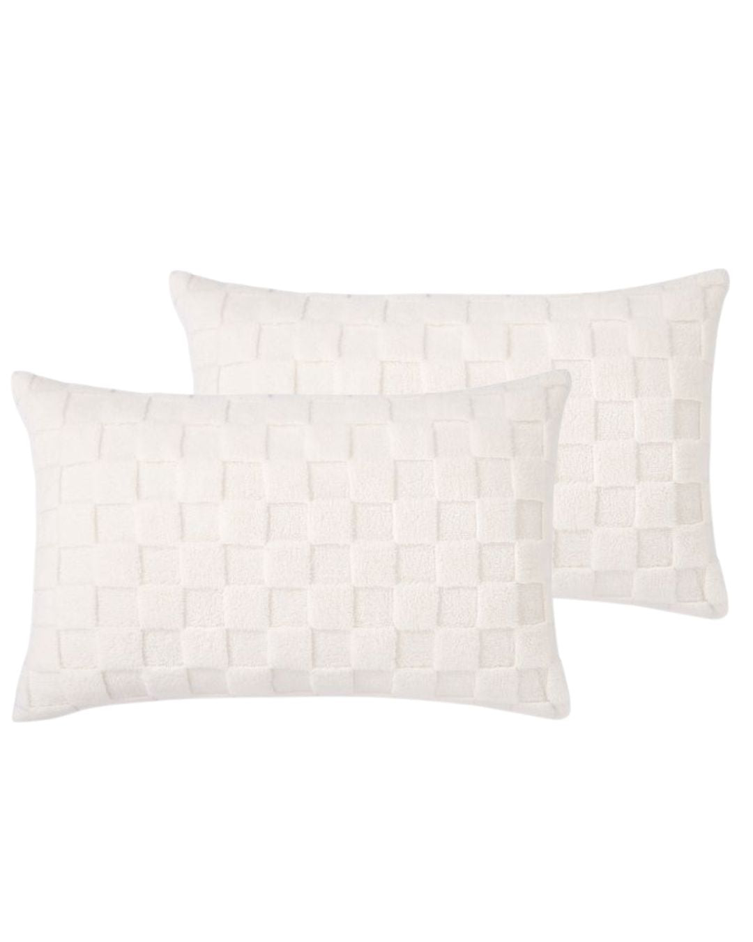 Morgan and Reid Checkered Cream Snuggle Fleece Pillowcase Pair on a styled bed with matching comforter