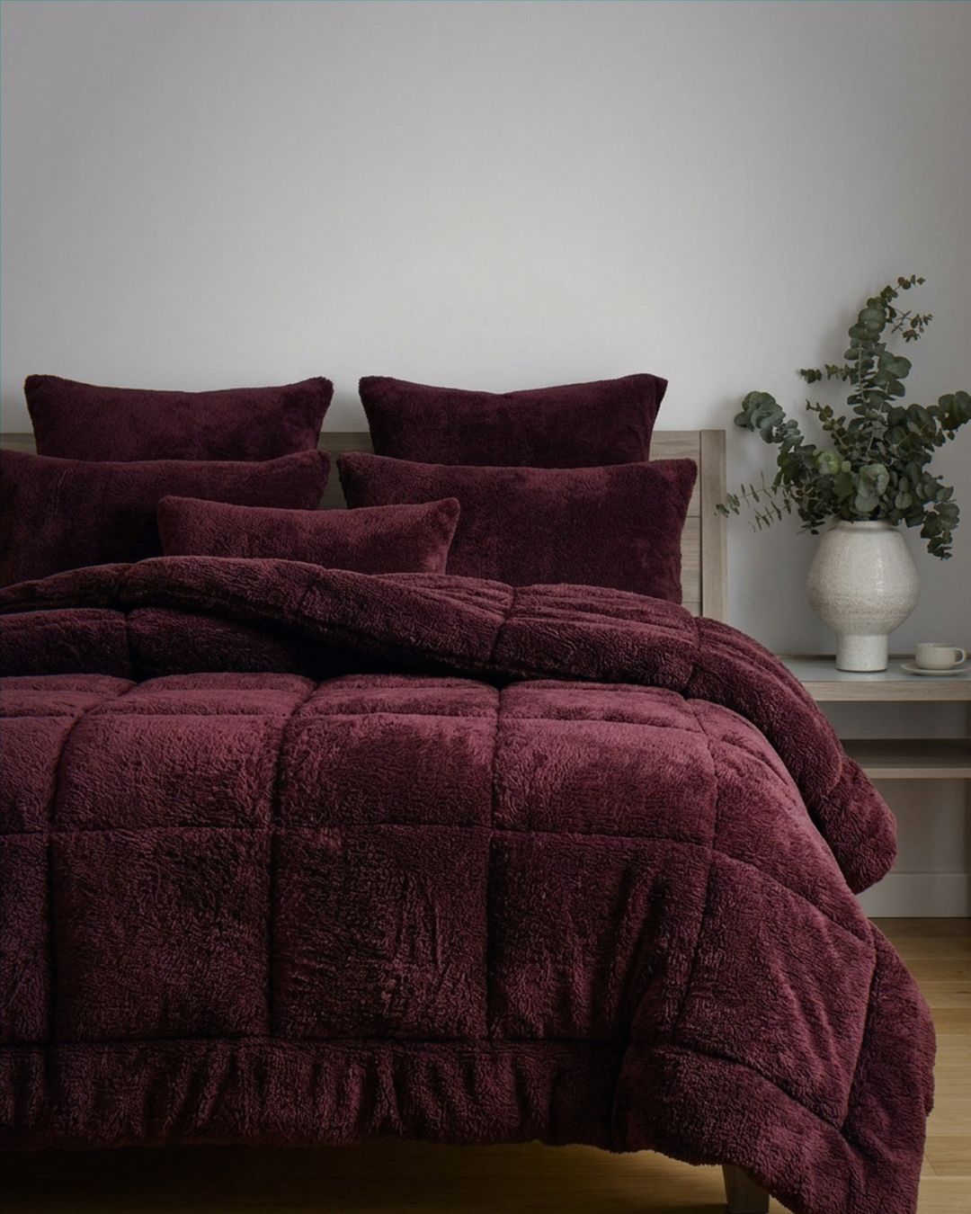 Close-up of the Morgan and Reid Burgundy Black Snuggle Fleece Pillowcase Pair showing fabric texture