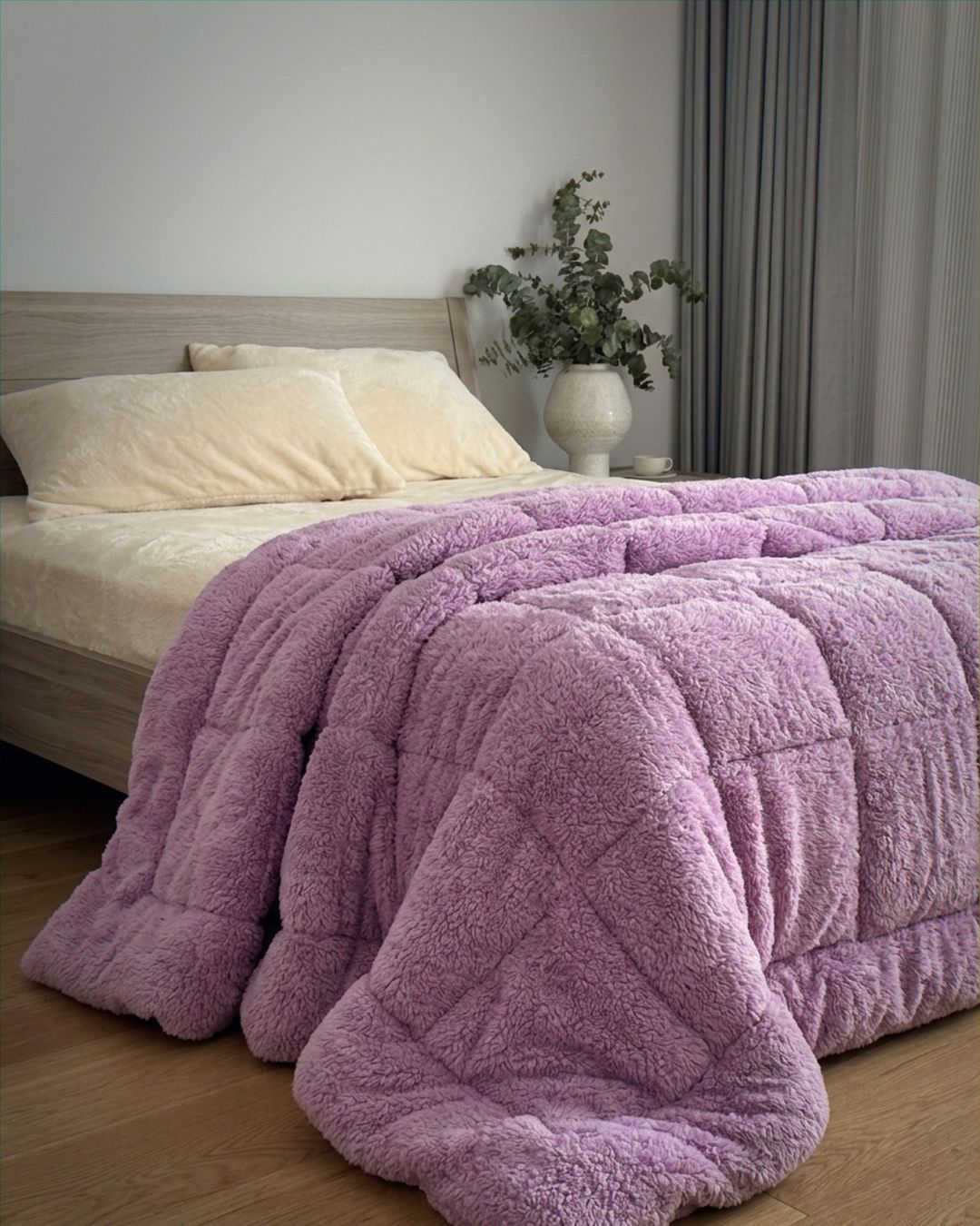 Morgan and Reid Calm Lavender Snuggle Fleece Comforter Set on a bed with matching pillowcases