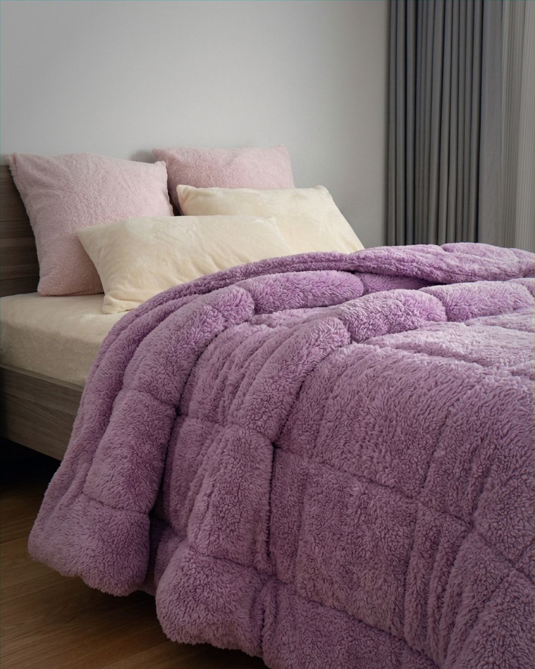 Overhead view of the Morgan and Reid Calm Lavender Snuggle Fleece Comforter Set on a made bed