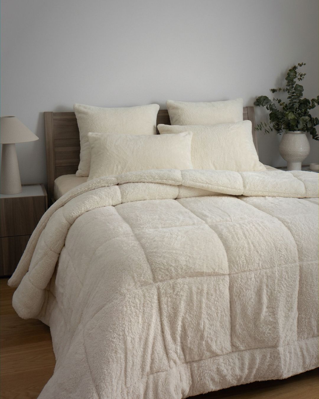 Morgan and Reid Ivory Snuggle Fleece Comforter Set styled on a neatly made bed in a bright bedroom