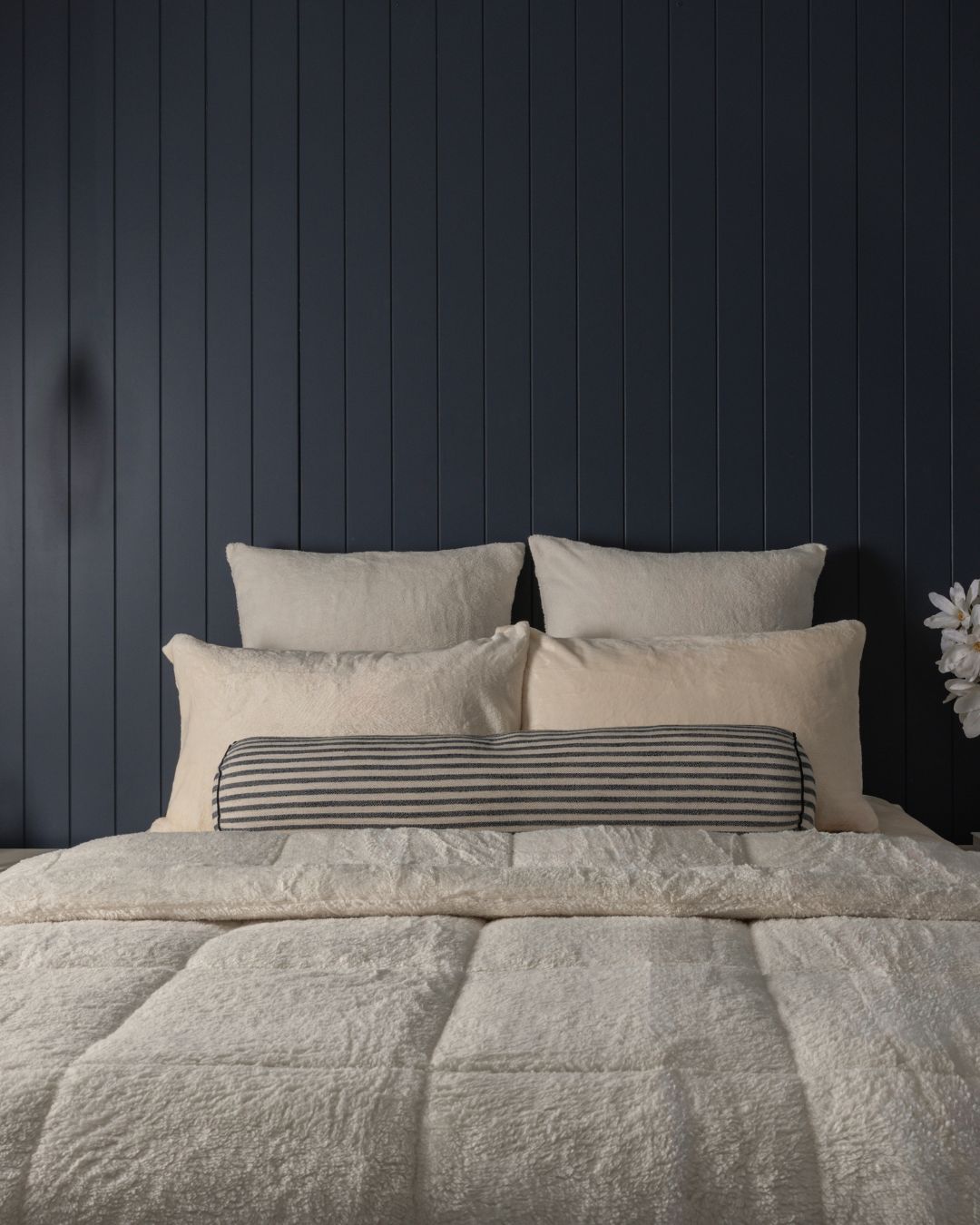 Overhead view of the Morgan and Reid Ivory Snuggle Fleece Comforter Set on a made bed