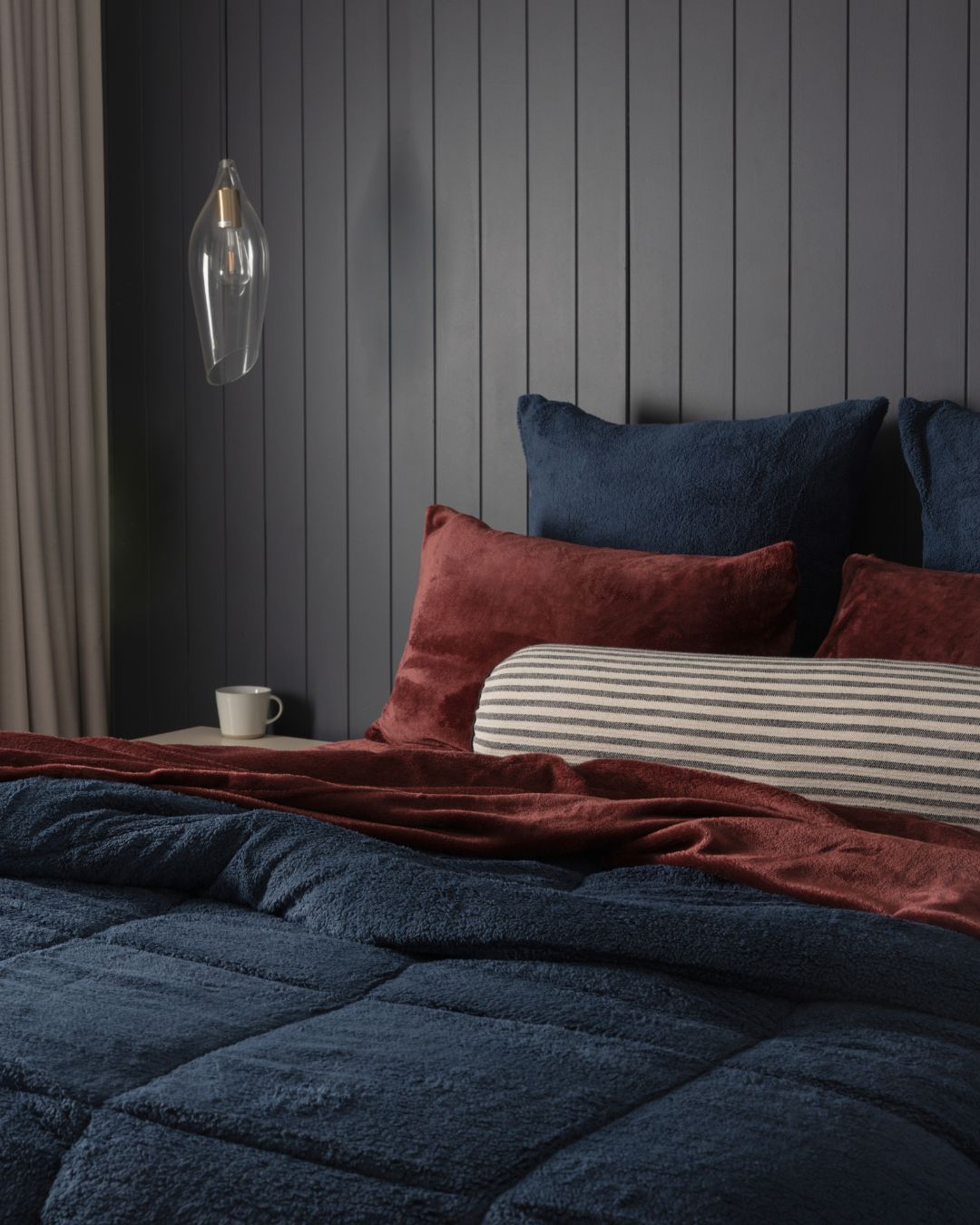 Close-up of the Morgan and Reid Midnight Blue Snuggle Fleece Comforter Set showing fabric texture and colour