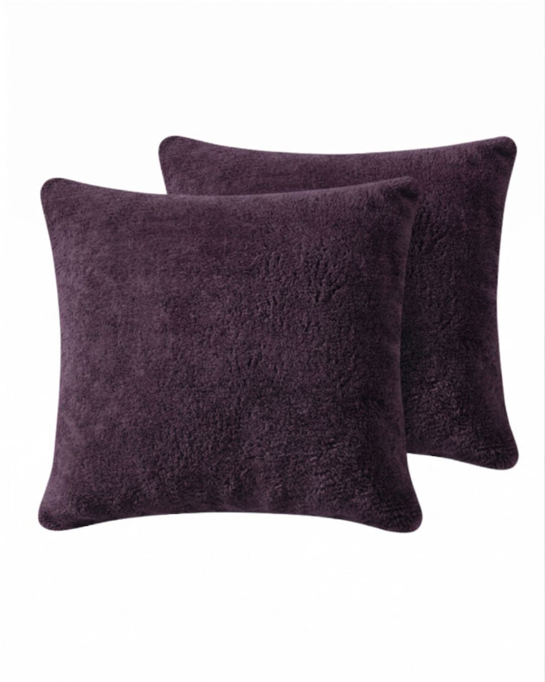 Morgan and Reid Plum Snuggle Fleece European Pillowcase Pair on a styled bed with matching comforter