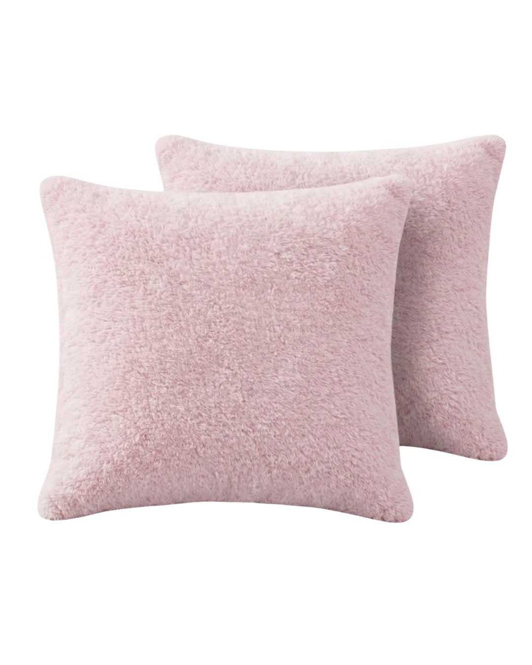 Morgan and Reid Chalk Pink Snuggle Fleece European Pillowcase Pair on a styled bed with matching comforter
