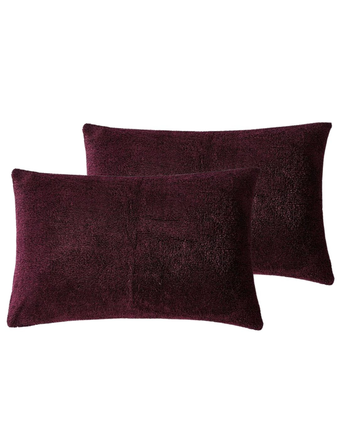 Morgan and Reid Burgundy Black Snuggle Fleece Pillowcase Pair on a styled bed with matching comforter