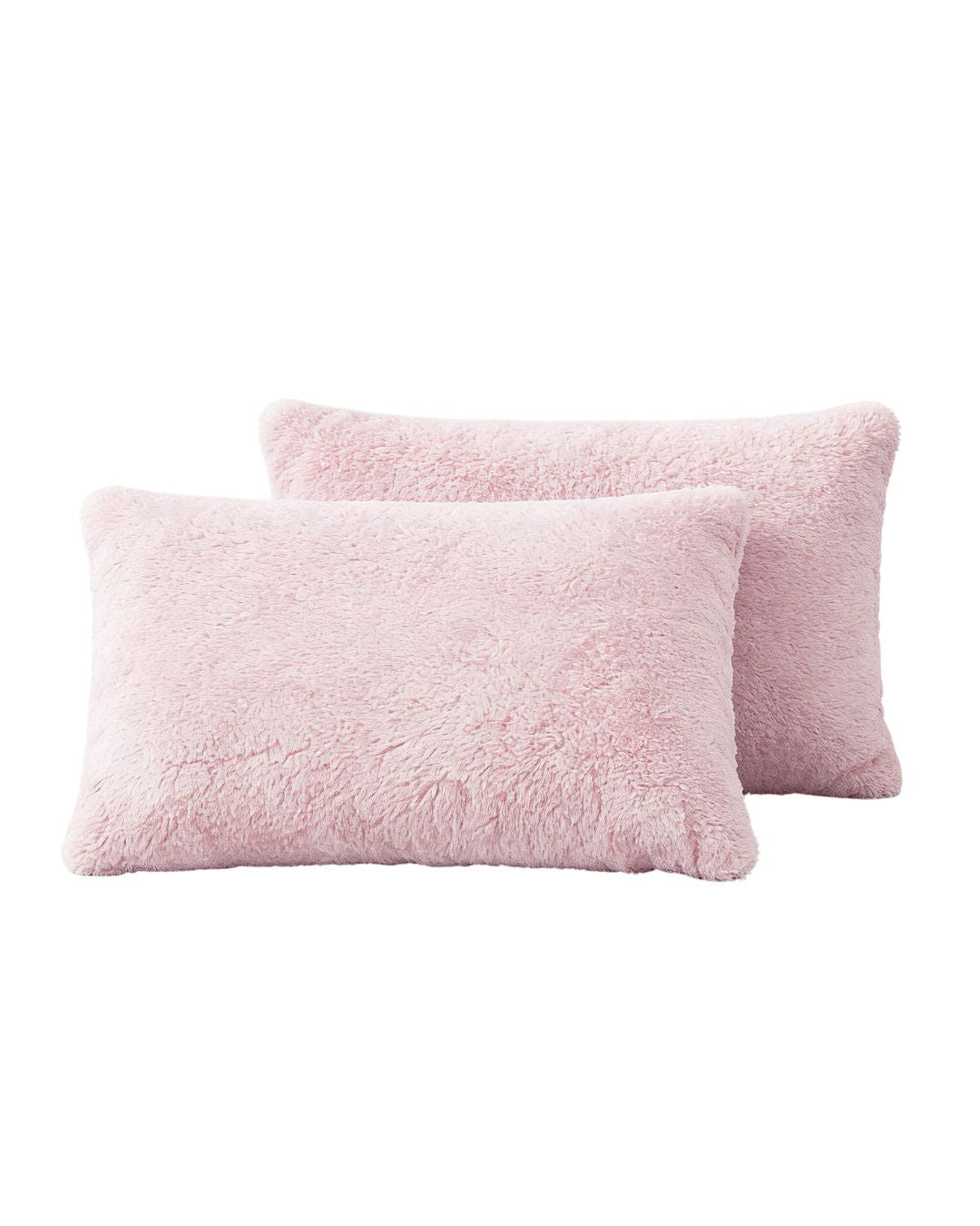 Morgan and Reid Chalk Pink Snuggle Fleece Pillowcase Pair on a styled bed with matching comforter