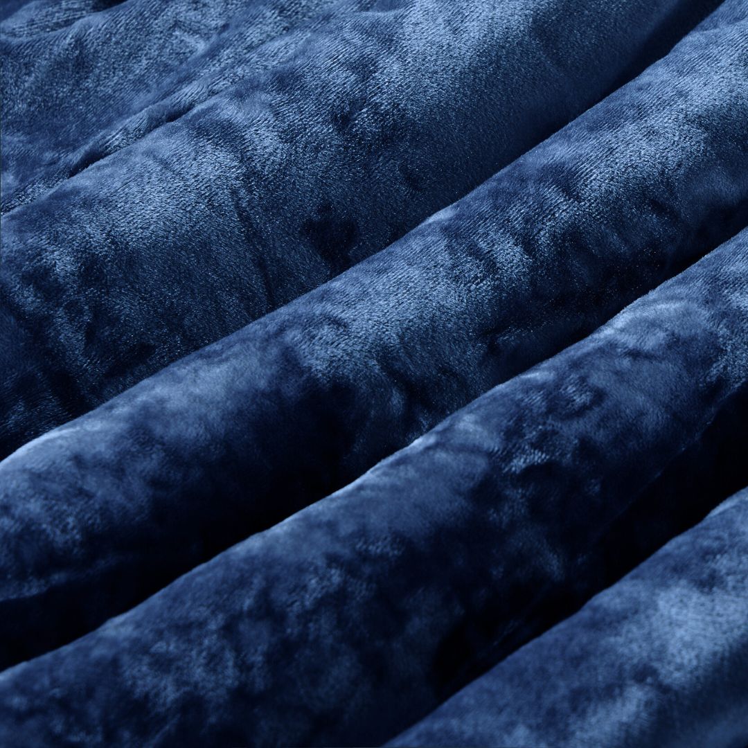 Detail shot of the Morgan and Reid Navy Velvet Crushed Snuggle Fleece European Pillowcase Pair on a pillow