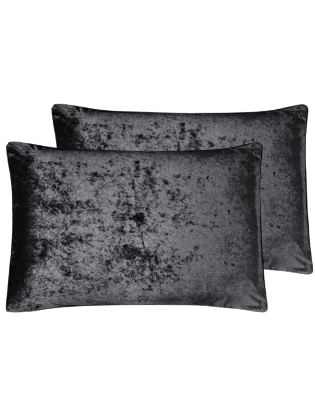 Morgan and Reid Black Velvet Crushed Snuggle Fleece Pillowcase Pair on a styled bed with matching comforter