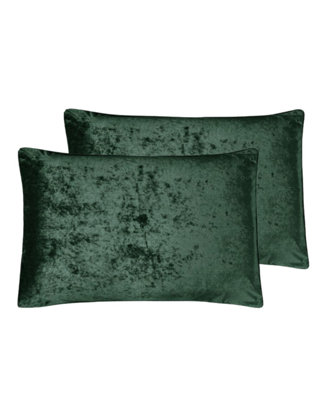 Morgan and Reid Sage Velvet Crushed Snuggle Fleece Pillowcase Pair on a styled bed with matching comforter