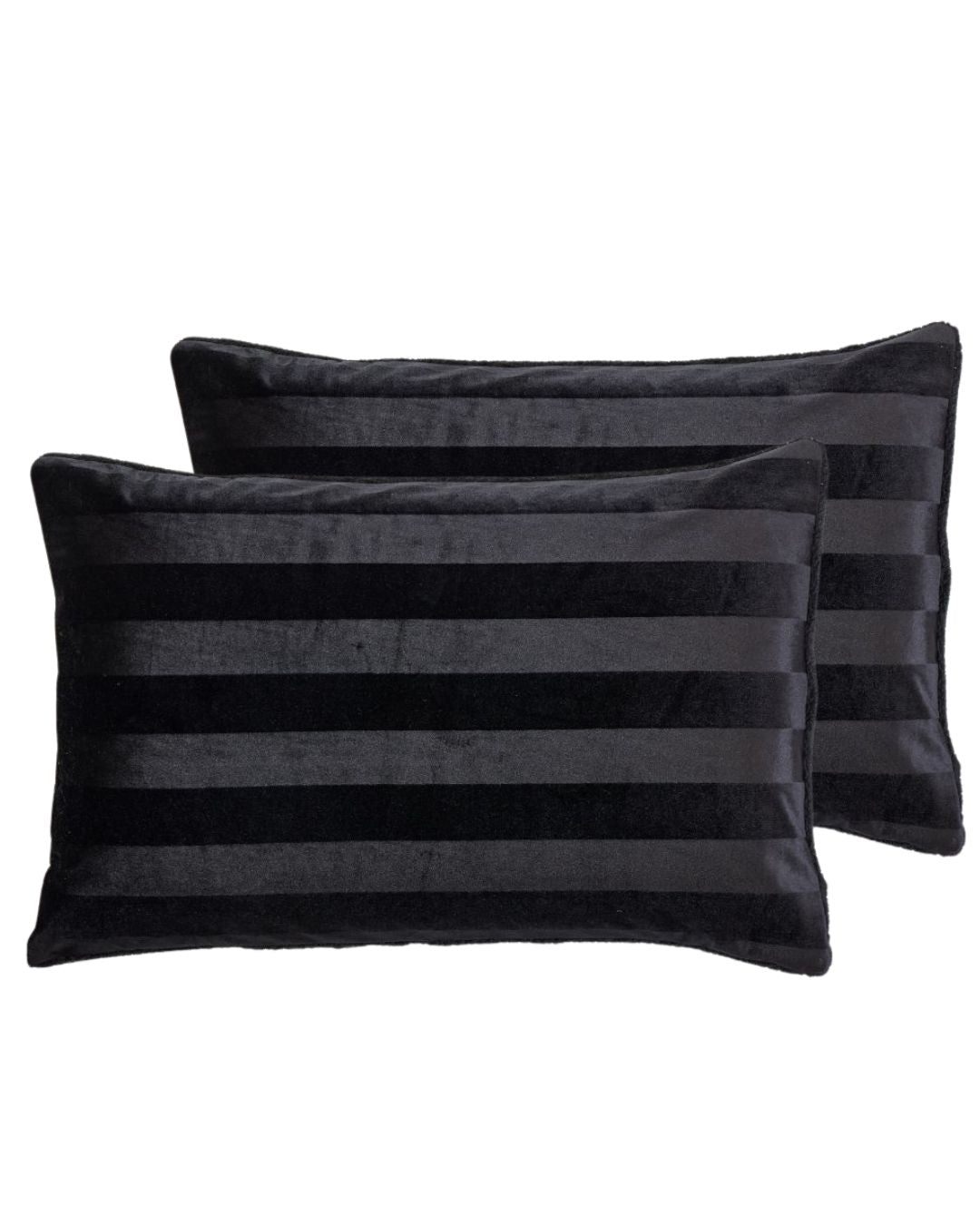 Morgan and Reid Black Velvet Stripe Crushed Snuggle Fleece Pillowcase Pair on a styled bed with matching comforter