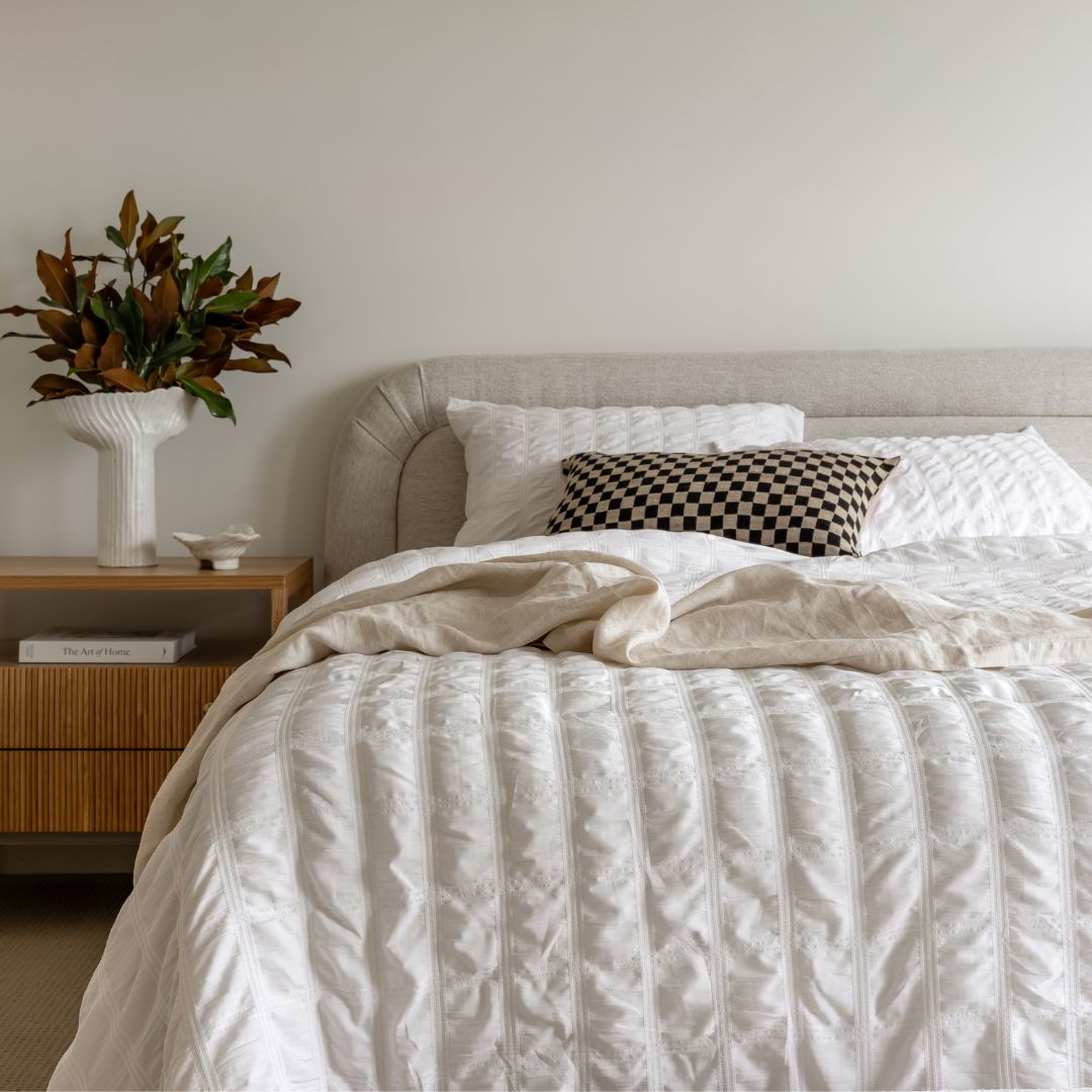 Morgan and Reid Whispers of White Comforter Set in a cosy bedroom lifestyle setting