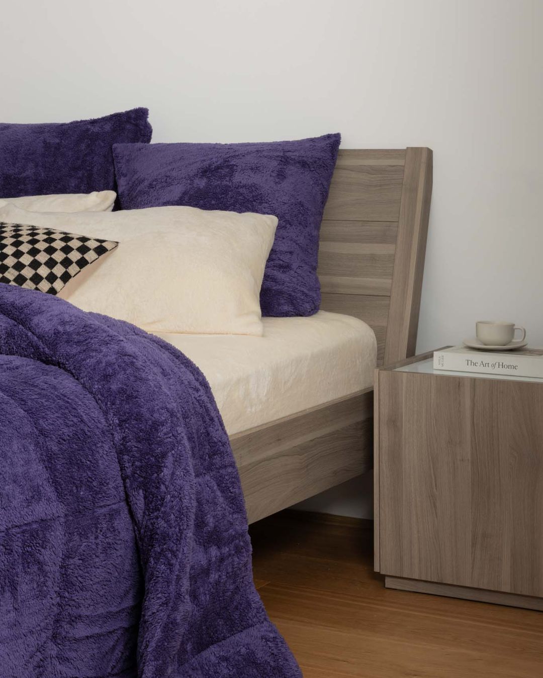 Morgan and Reid Mulberry Purple Snuggle Fleece European Pillowcase Pair on bed with coordinating bedding