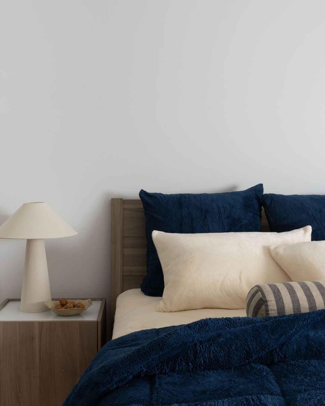 Detail shot of the Morgan and Reid Pagnet Blue Snuggle Fleece European Pillowcase Pair on a pillow