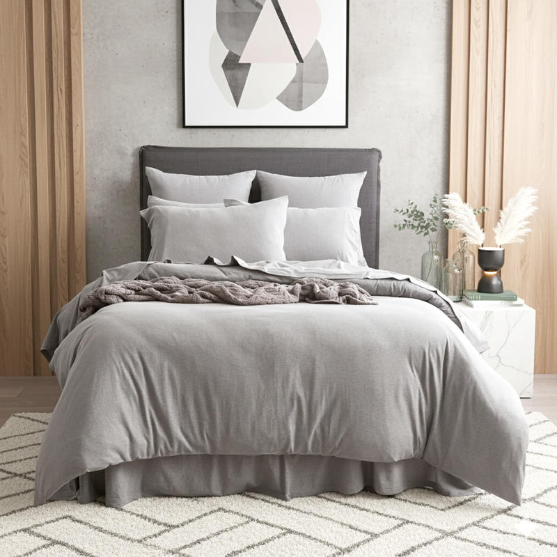 Styled bed featuring Renee Taylor Charcoal European Pillowcase with matching jersey bedding.