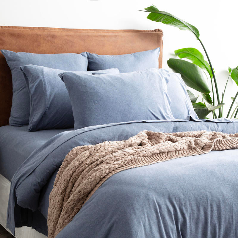 Relaxed bedroom featuring Renee Taylor Ink Jersey Quilt Cover and neutral decor.