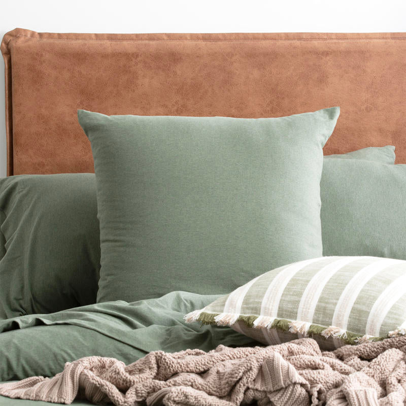 Styled bedroom featuring Renee Taylor Olive European Pillowcase with matching jersey bedding.