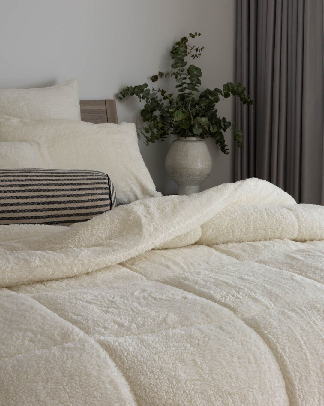 Close-up of the Morgan and Reid Bright White Snuggle Fleece Pillowcase Pair showing fabric texture