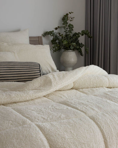 Close-up of the Morgan and Reid Bright White Snuggle Fleece Pillowcase Pair showing fabric texture