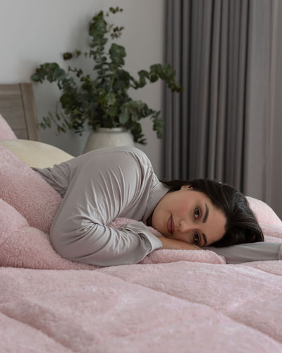 Morgan and Reid Chalk Pink Snuggle Fleece Comforter Set full bed view with coordinating decor