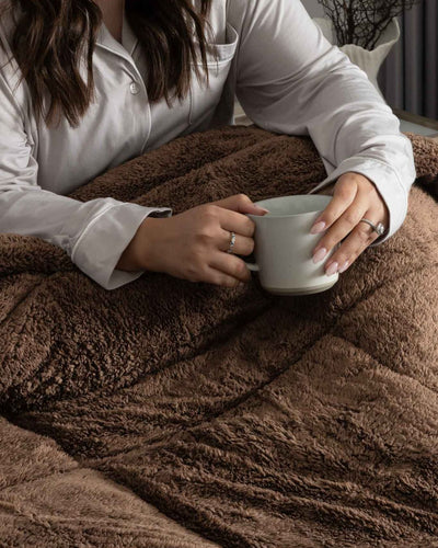 Morgan and Reid Cocoa Snuggle Fleece Comforter Set in a cosy bedroom lifestyle setting
