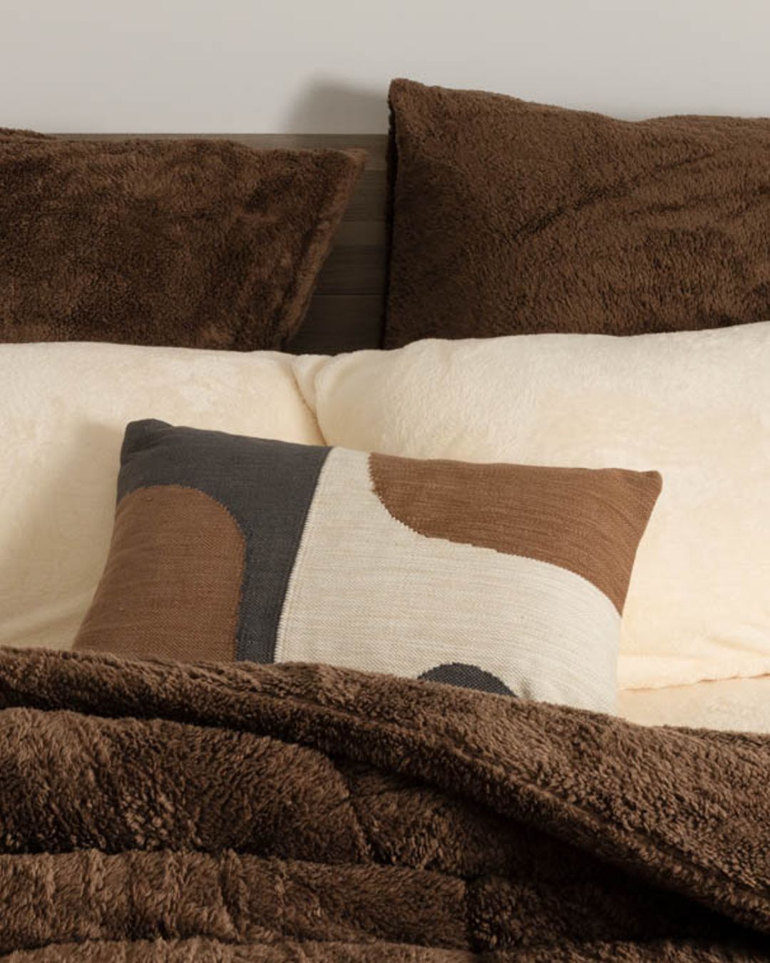 Close-up of the Morgan and Reid Cocoa Snuggle Fleece European Pillowcase Pair showing fabric texture