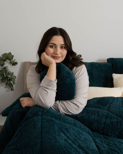Detail shot of the Morgan and Reid Deep Teal Snuggle Fleece Comforter Set fabric and finish