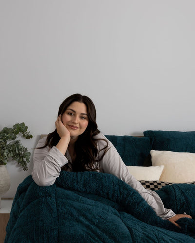Morgan and Reid Deep Teal Snuggle Fleece Comforter Set styled bed with coordinating bedroom decor