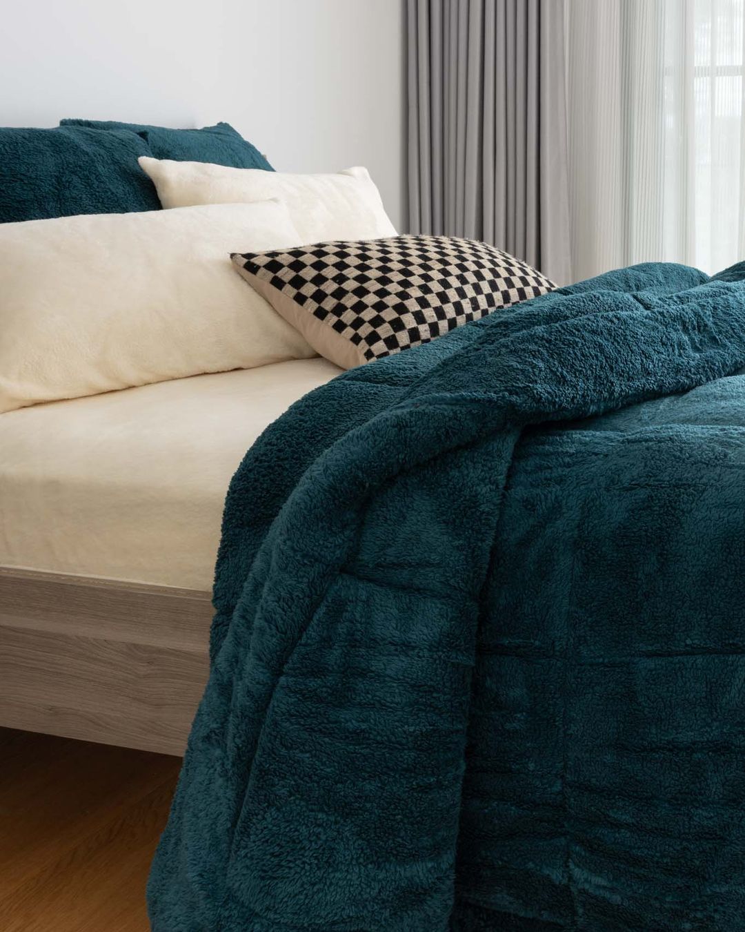 Close-up of the Morgan and Reid Deep Teal Snuggle Fleece Comforter Set showing fabric texture and colour