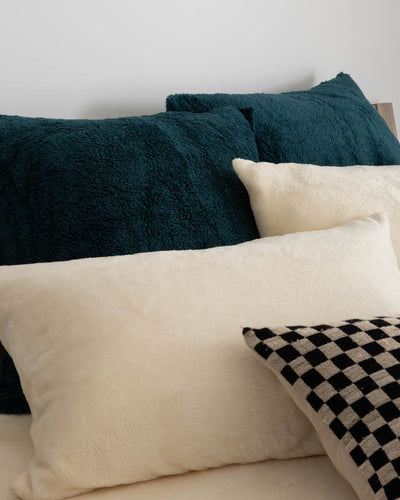 Close-up of the Morgan and Reid Deep Teal Snuggle Fleece European Pillowcase Pair showing fabric texture