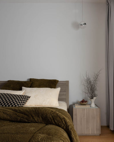 Detail shot of the Morgan and Reid Military Olive Snuggle Fleece European Pillowcase Pair on a pillow