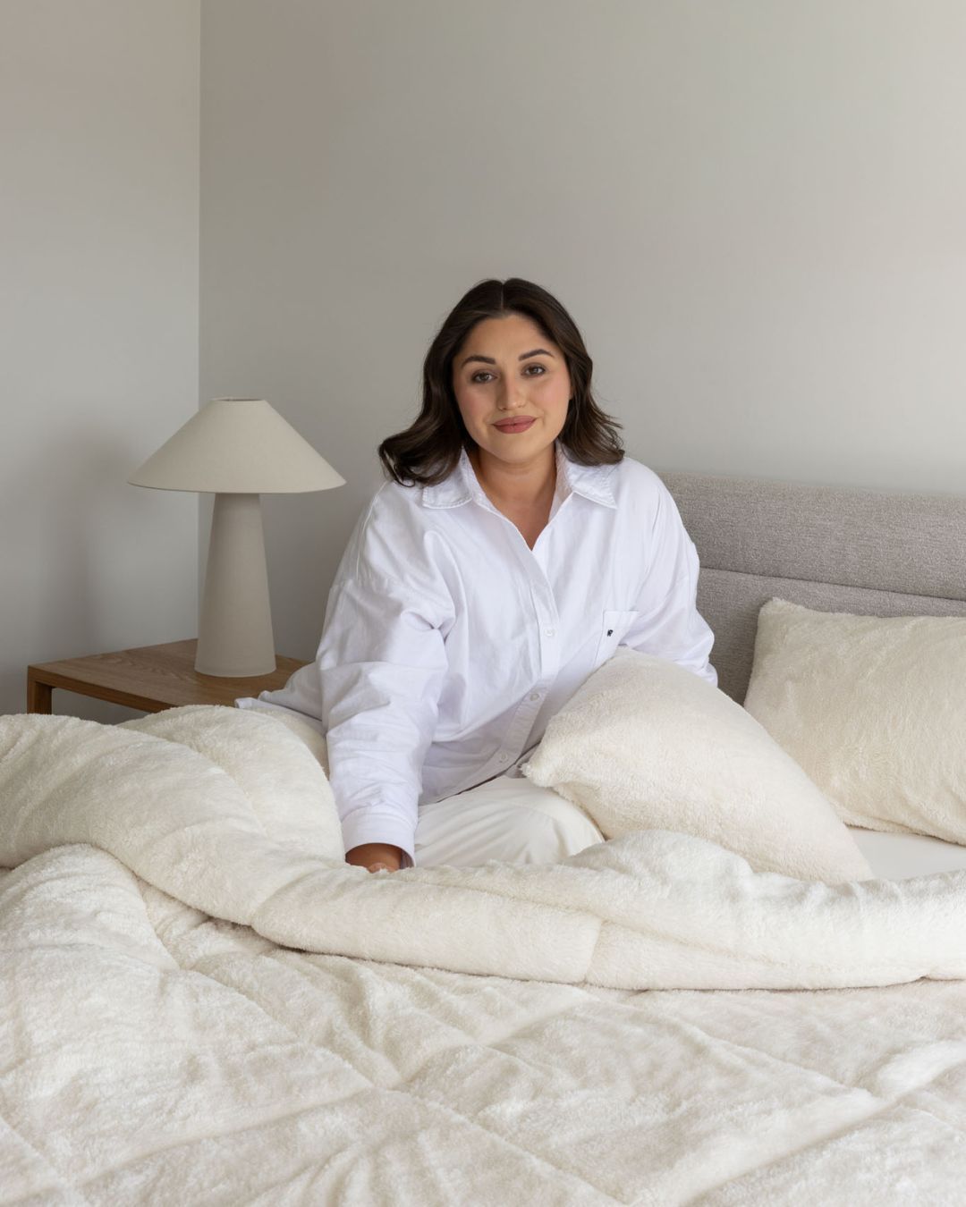 Morgan and Reid All Seasons Snuggle Fleece Ivory Comforter Set folded to show depth and plush texture