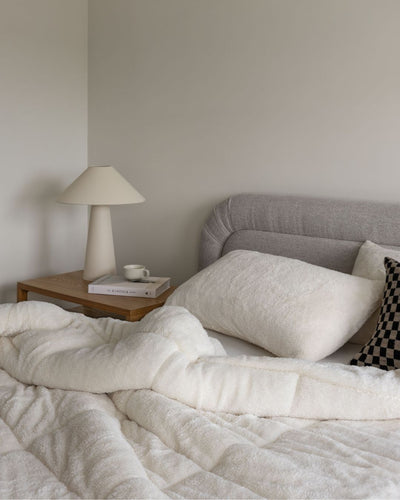 Morgan and Reid All Seasons Snuggle Fleece Ivory Comforter Set in a cosy bedroom lifestyle setting