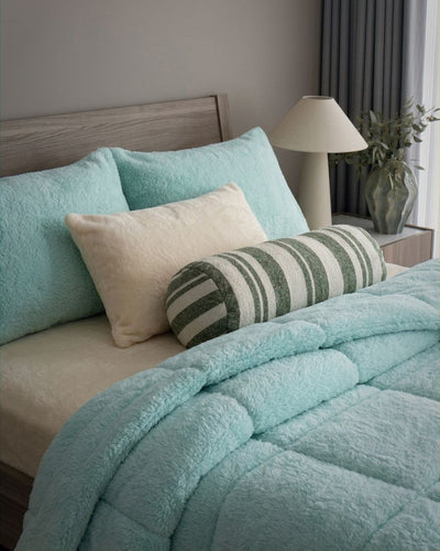 Overhead view of the Morgan and Reid All Seasons Snuggle Fleece Mint Comforter Set on a made bed