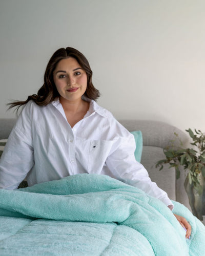 Morgan and Reid All Seasons Snuggle Fleece Mint Comforter Set folded to show depth and plush texture