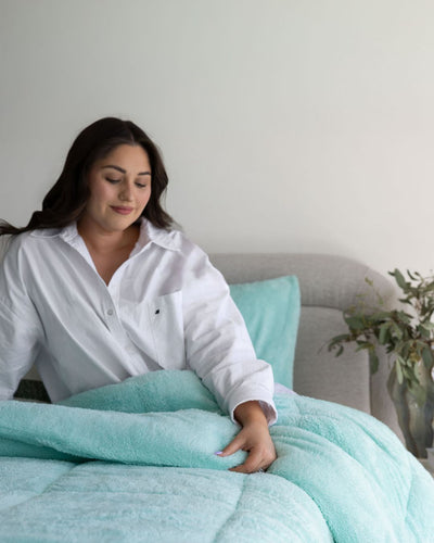 Morgan and Reid All Seasons Snuggle Fleece Mint Comforter Set styled bed with coordinating bedroom decor