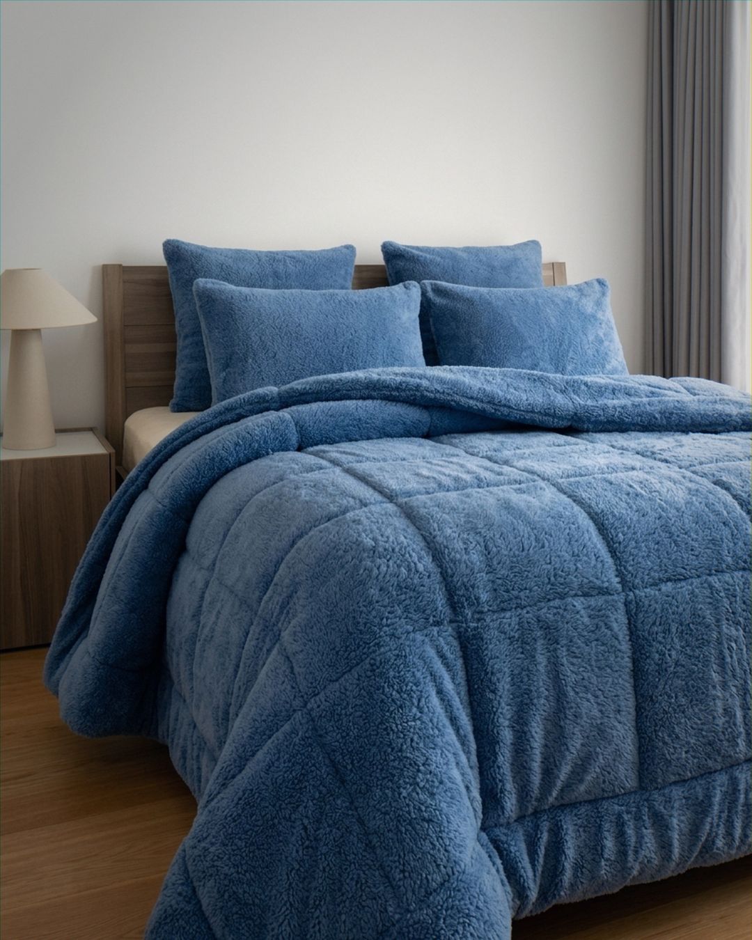 Morgan and Reid All Seasons Snuggle Fleece Smokey Blue Comforter Set styled on a neatly made bed in a bright bedroom